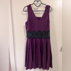 Jewel, toned, cut away lace cocktail dress ready for the holidays!
